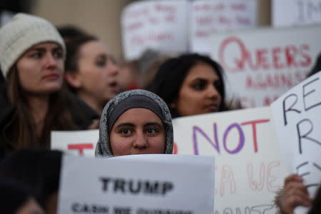 FILE PHOTO - People participate in a protest against President Donald Trump's travel ban at Columbia University in New York City, U.S. January 30, 2017. REUTERS/Stephanie Keith/File Photo