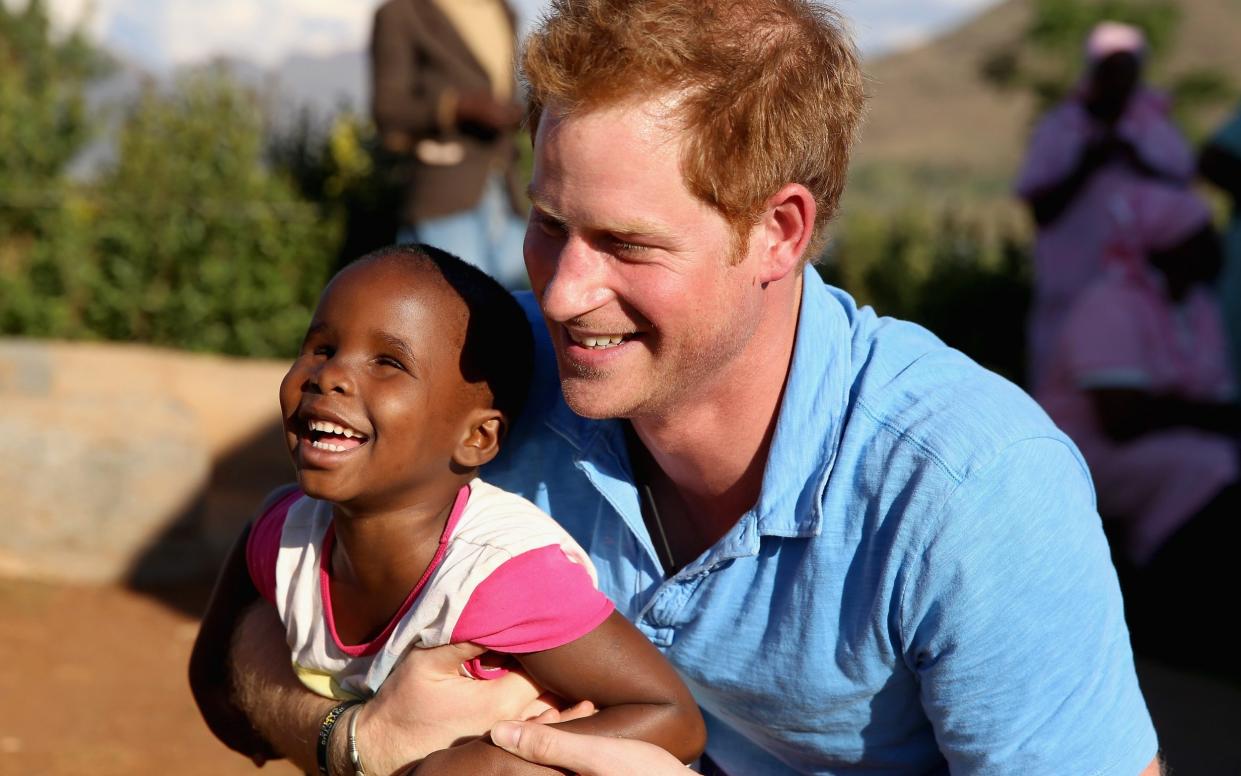 Prince Harry on a trip to Lesotho in 2006 - Getty 