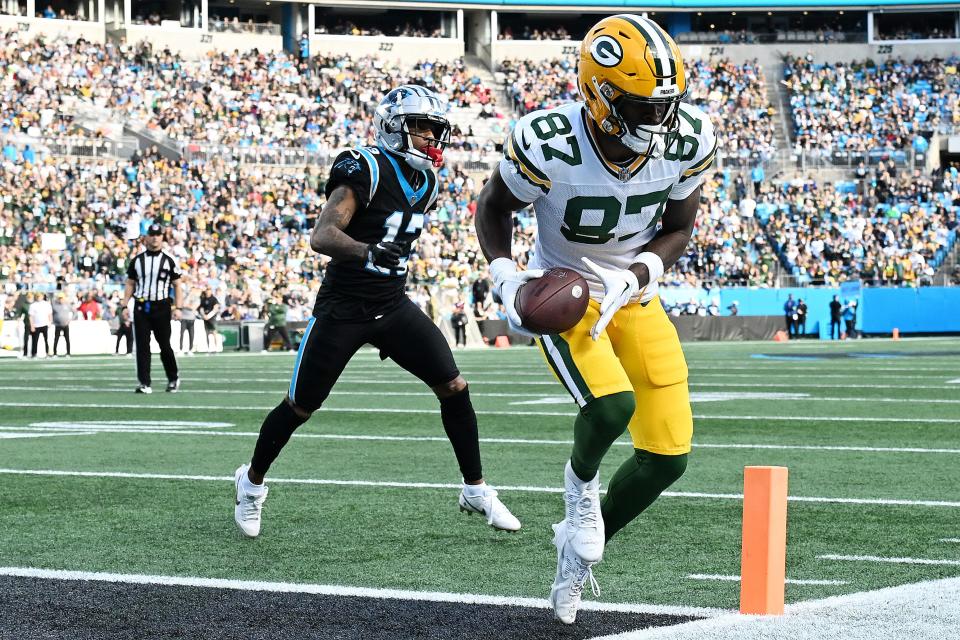 Green Bay Packers receiver Romeo Doubs scores against the Carolina Panthers.