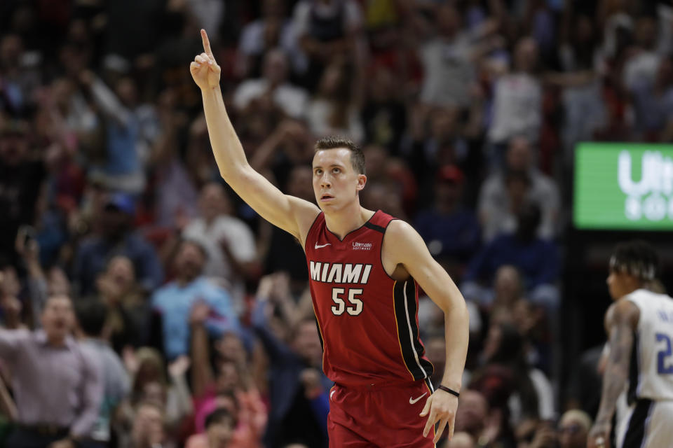 Miami Heat forward Duncan Robinson celebrates after scoring during the second half of the team's NBA basketball game against the Orlando Magic, Wednesday, March 4, 2020, in Miami. (AP Photo/Wilfredo Lee)