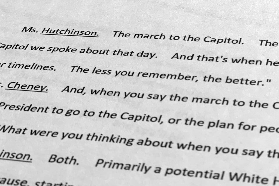 A page from an interview with Cassidy Hutchinson, former aide to Trump White House chief of staff Mark Meadows, released by the House select committee investigating the Jan. 6 attack on the U.S. Capitol, is photographed Thursday, Dec. 22, 2022. Hutchinson told the committee that her first lawyer advised her against being fully forthcoming with the panel, telling her, "the less you remember, the better." (AP Photo/Jon Elswick)