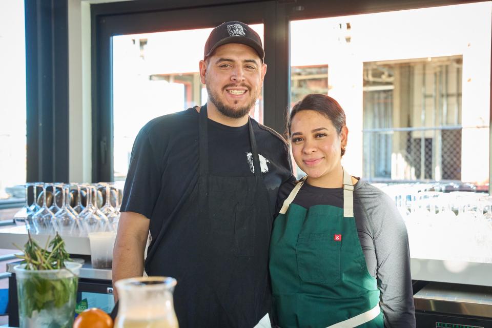 Feb 2, 2023; Tempe, AZ, United States; Husband and wife Armando Hernandez, left, and Nadia Holguin pose for a photo at Cocina Chiwas in Culdesac Tempe on Thursday. Feb. 2, 2023. Mandatory Credit: Alex Gould/The Republic