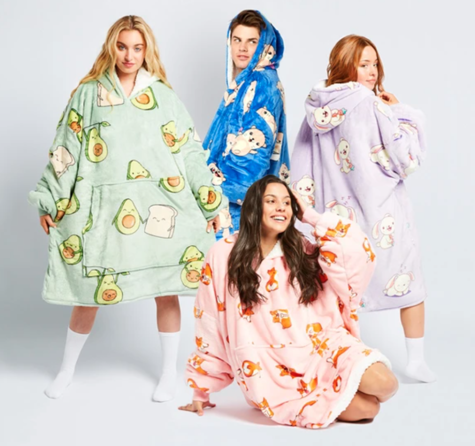 family dressed in Oodies hooded blankets currently on sale