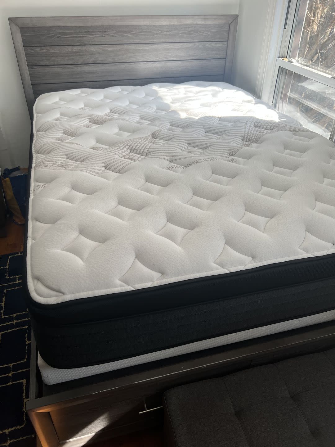 a bed with white sheets