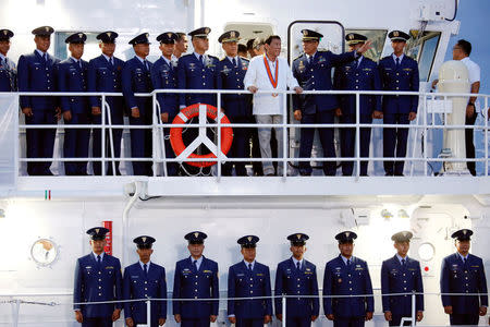 Philippines President Rodrigo Duterte visits the newly inaugurated Japan's built patrol ship during the ceremony marking the anniversary of the Philippines Coast Guard in Manila, Philippines, October 12, 2016. REUTERS/Damir Sagolj/File Photo