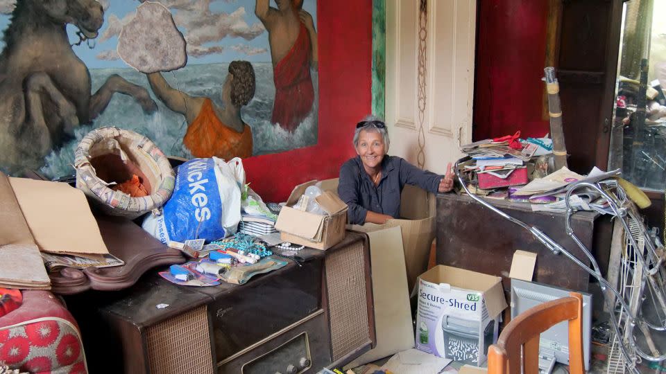 Jan Williams sorts some of the contents of her late uncle's house. - Chris Teasdale