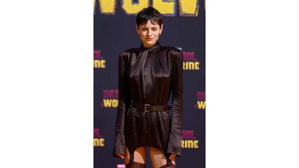 Styled by Harry Lambert, the star wore an ebony shirt dress complete with fluted sleeves and suspenders