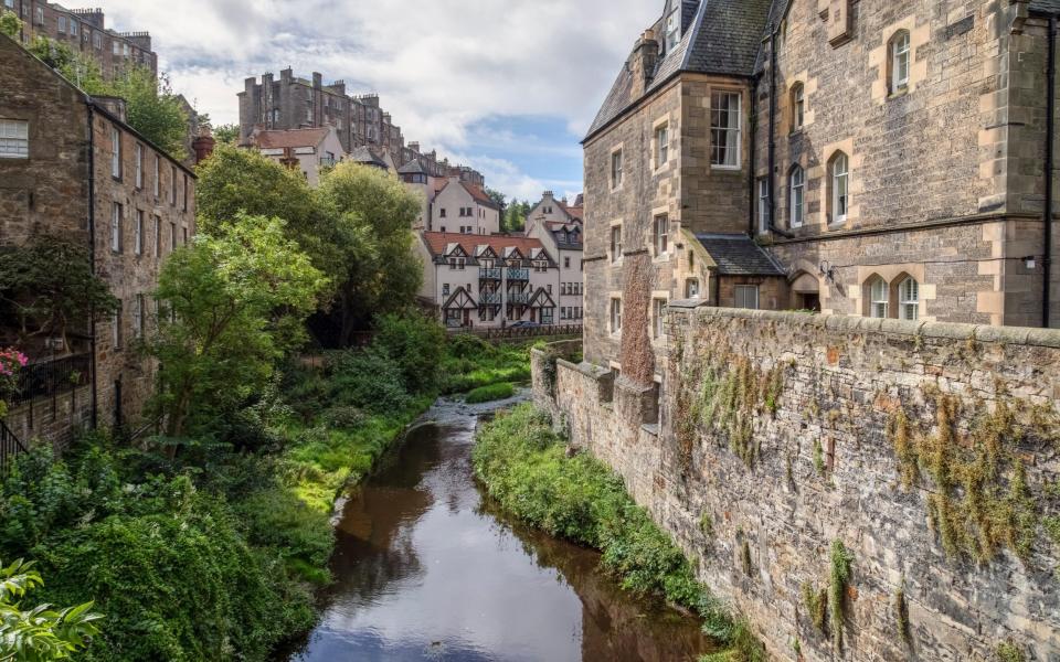 A river and stone buildings in Dean Village, Edinburgh, Lothian, Scotland, United Kingdom - Joana Kruse / Alamy Stock Photo