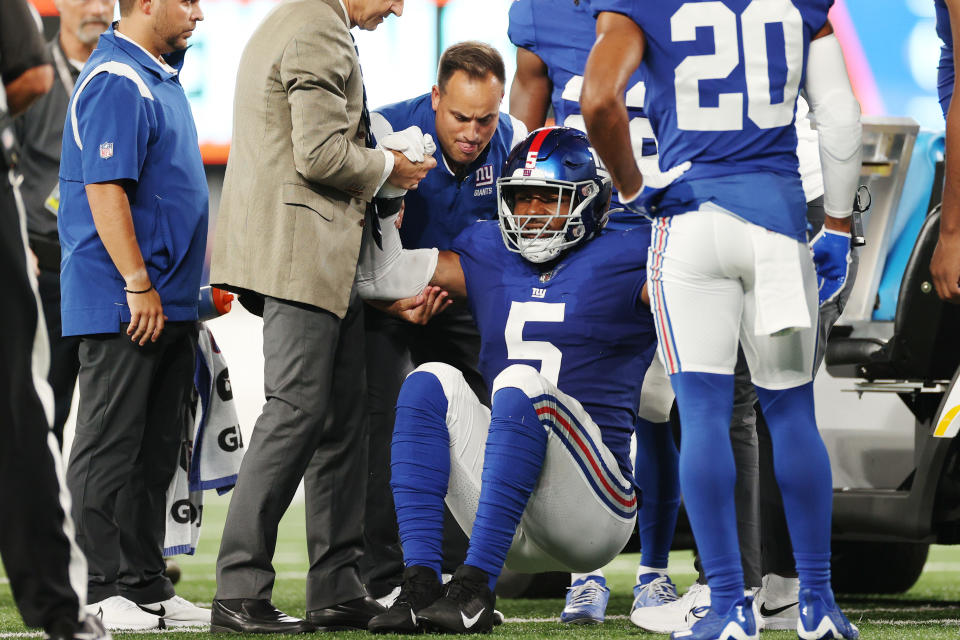 EAST RUTHERFORD, NEW JERSEY - AUGUST 21: Kayvon Thibodeaux #5 of the New York Giants stands up after an apparent injury during the first half of a preseason game against the Cincinnati Bengals at MetLife Stadium on August 21, 2022 in East Rutherford, New Jersey. (Photo by Sarah Stier/Getty Images)