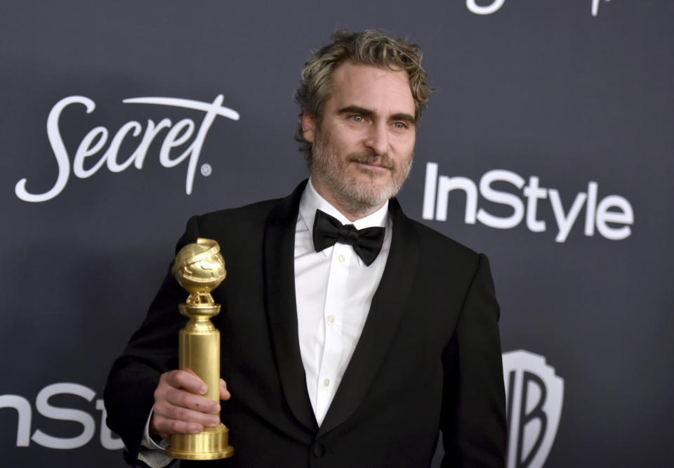Joaquin Phoenix, winner of the award for best performance by an actor in a motion picture drama for &quot;Joker&quot;, arrives at the InStyle and Warner Bros. Golden Globes afterparty at the Beverly Hilton Hotel on Sunday, Jan. 5, 2020, in Beverly Hills, Calif. (Richard Shotwell/Invision/AP)