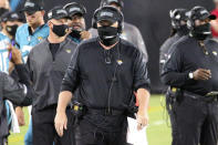 Jacksonville Jaguars head coach Doug Marrone, center, walks the sidelines during the first half of an NFL football game against the Miami Dolphins, Thursday, Sept. 24, 2020, in Jacksonville, Fla. (AP Photo/Stephen B. Morton)