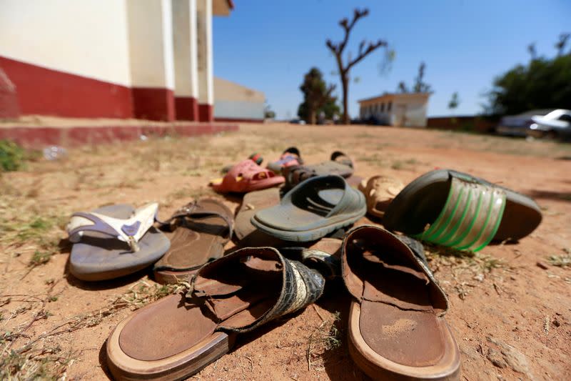 FILE PHOTO: A collection of student footwears left behind after gunmen abducted students at the Government Science school in Kankara