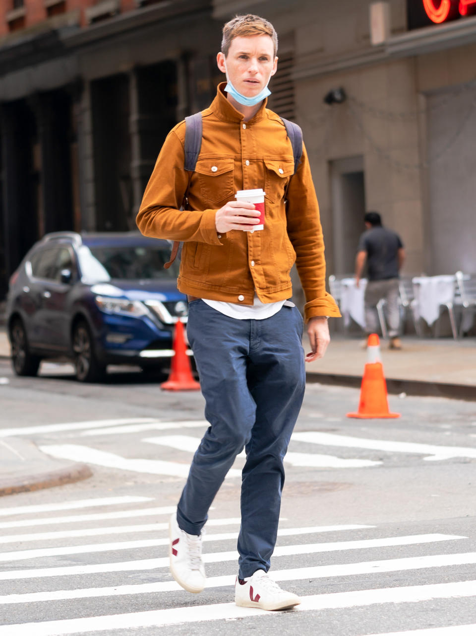 <p>Eddie Redmayne enjoys a cup of coffee during his day off from filming <em>The Good Nurse</em> on Wednesday in N.Y.C.</p>