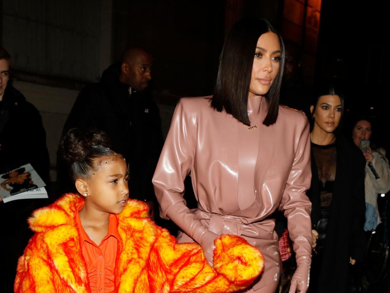 Kim Kardashian and daughter North West arrive at the Ferdi restaurant in March 2021.