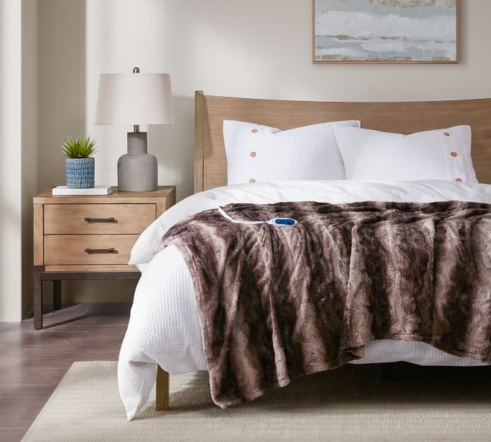 <p><a href="https://go.redirectingat.com?id=74968X1596630&url=https%3A%2F%2Fwww.potterybarn.com%2Fproducts%2Fbeautyrest-oversized-faux-fur-heated-throw-mp&sref=https%3A%2F%2Fwww.womansday.com%2Frelationships%2Ffamily-friends%2Fg60254879%2Fbest-gifts-for-grandparents%2F" rel="nofollow noopener" target="_blank" data-ylk="slk:Shop Now;elm:context_link;itc:0;sec:content-canvas" class="link ">Shop Now</a></p><p>Heated Oversized Faux Fur Throw</p><p>potterybarn.com</p><p>$79.00</p><span class="copyright">Beautyrest</span>