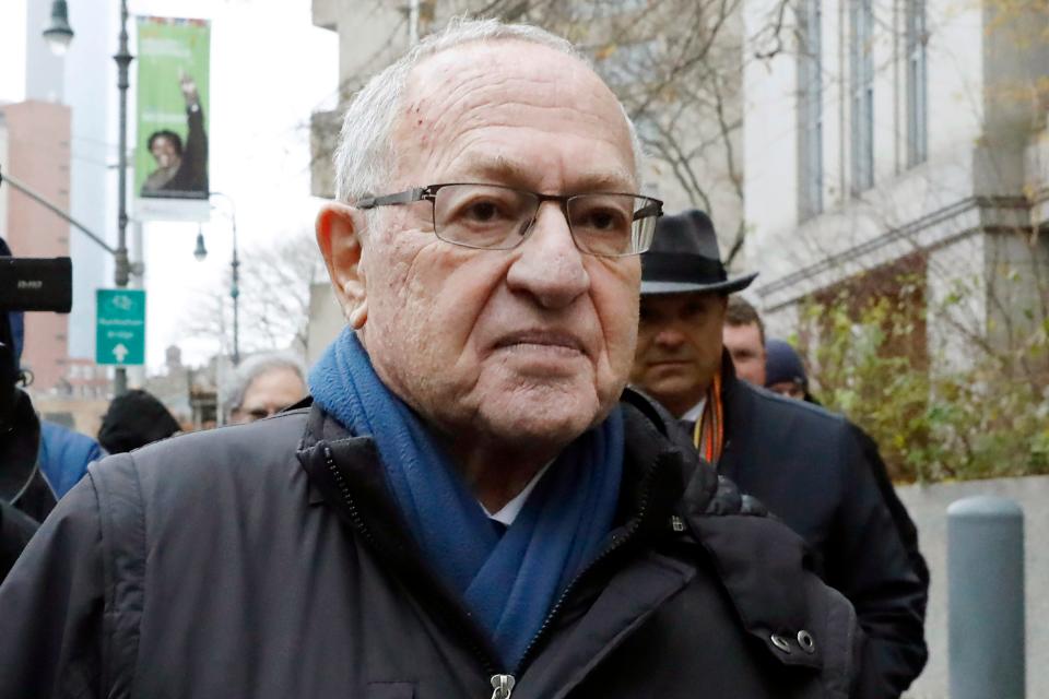 Attorney Alan Dershowitz leaves federal court, in New York, Dec. 2, 2019.