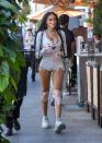 <p>Winnie Harlow enjoys a glass of wine on the go on Thursday night at Il Pastaio restaurant in Beverly Hills. </p>