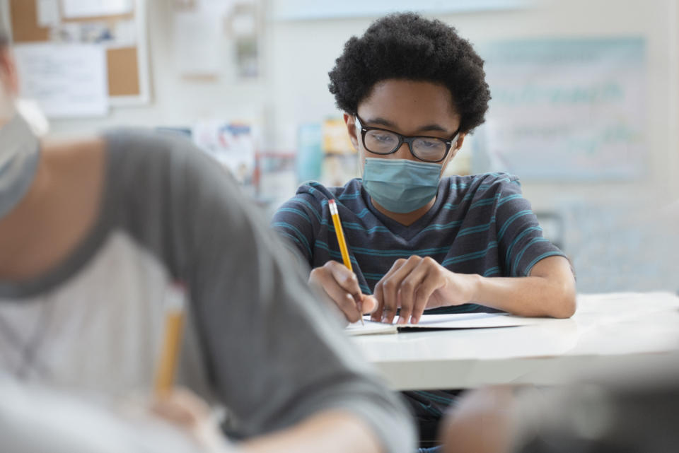 Student back to school wearing mask covid 19