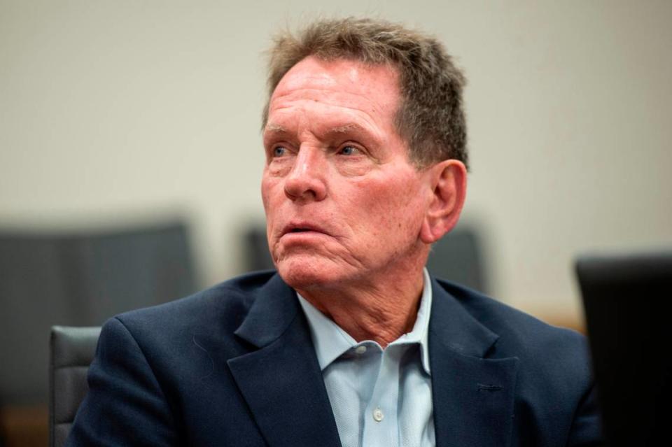 Cliff Kirkland speaks to his lawyer during Kirkland’s trial for allegedly molesting underage girls in Harrison County Circuit Court in Biloxi on Tuesday, May 17, 2022.