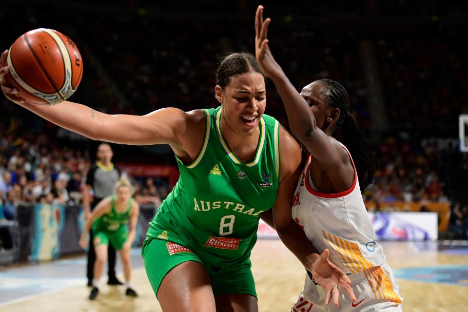 Australia's center Liz Cambage (L) vies with Spain's forward Astou Ndour during the FIBA 2018 Women's Basketball World Cup semifinal match between Spain and Australia at the Santiago Martin arena in San Cristobal de la Laguna on the Canary island of Tenerife on September 29, 2018. (Photo by JAVIER SORIANO / AFP)        (Photo credit should read JAVIER SORIANO/AFP via Getty Images)