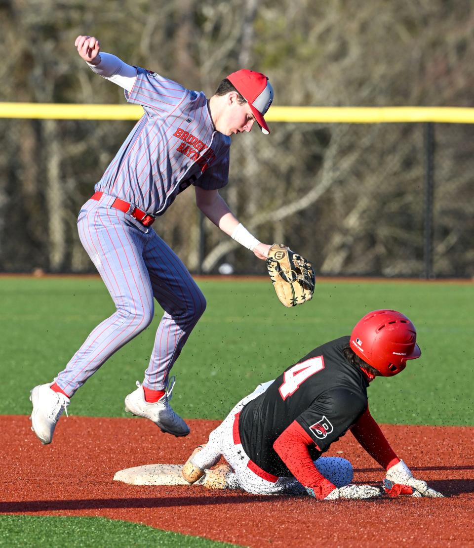 HYANNIS 04/08/24 Finn O'Donnell of Barnstable breaks up the throw to Jack Ritchie of Bridgewater-Raynham . baseball
Ron Schloerb/Cape Cod Times