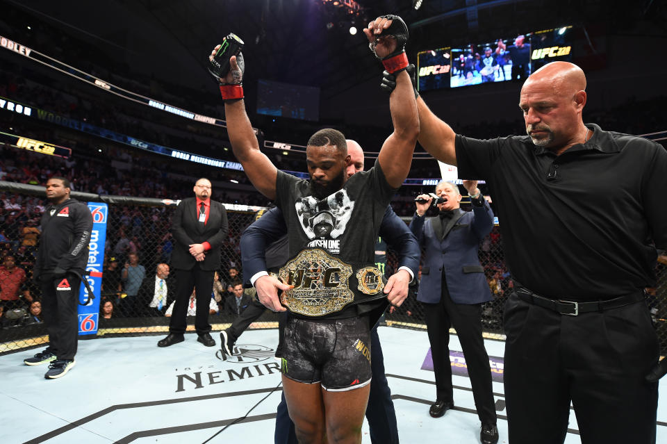 UFC welterweight champion Tyron Woodley celebrates after defeating Darren Till during UFC 228 at American Airlines Center on Sept. 8, 2018 in Dallas, Texas. (Getty Images)