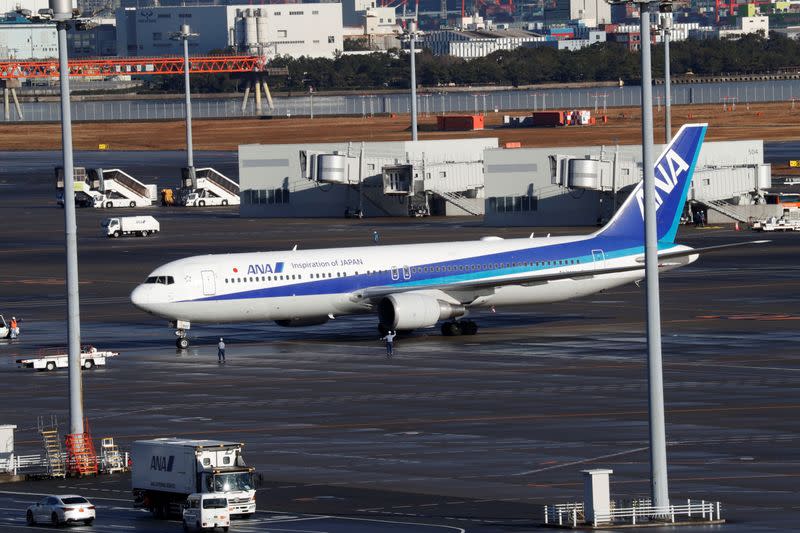 Japanese nationals in Wuhan return to Japan on charter plane