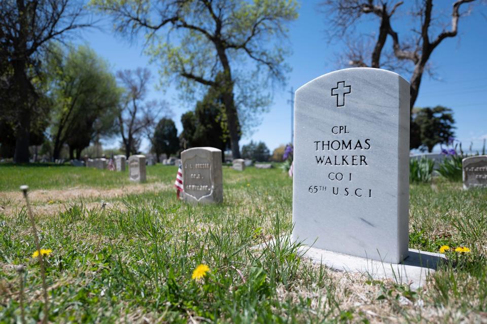 A row of headstones mark the final resting places of some of the thousands of military veterans at Roselawn Cemetery.