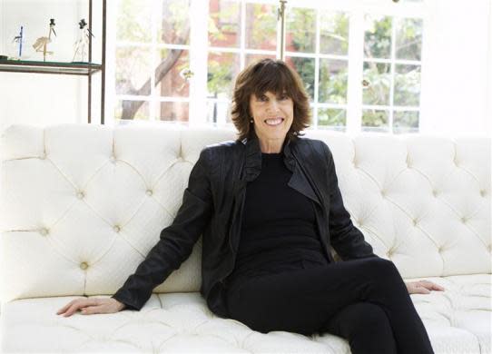 Nora Ephron poses for a portrait in her home in New York November 3, 2010. As you age, live life to the fullest -- travel to exotic places, eat good food, walk in the park, read lots of books and under no circumstances eat egg-white omelettes. That's the nub of Nora Ephron's new book, "I Remember Nothing," an acerbic, humorous set of essays that works as a sequel to her 2006 best-seller, "I Feel Bad About My Neck." Picture taken November 3, 2010. REUTERS/Lucas Jackson (UNITED STATES - Tags: ENTERTAINMENT)