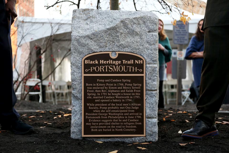 Members of the Black Heritage Trail of New Hampshire unveil a marker in honor of Pomp and Candace Spring in Portsmouth Thursday, Nov. 18, 2021.