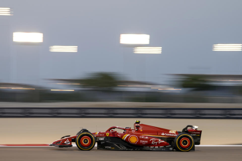 Ferrari driver Carlos Sainz of Spain steers his car for a Formula One pre season test at the Bahrain International Circuit in Sakhir, Bahrain, Thursday, Feb. 22, 2024. (AP Photo/Darko Bandic)