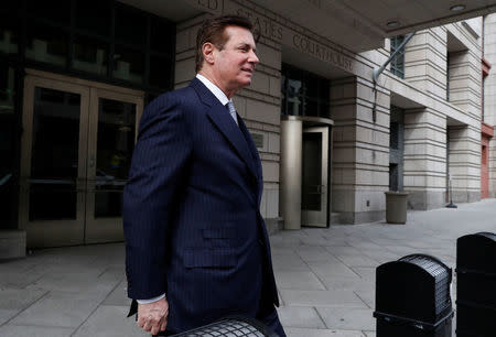 Paul Manafort leaves U.S. District Court in Washington, U.S., February 14, 2018. REUTERS/Leah Millis