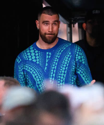 <p>James Gourley/Shutterstock</p> Travis Kelce at the Eras Tour in Sydney in February 2024