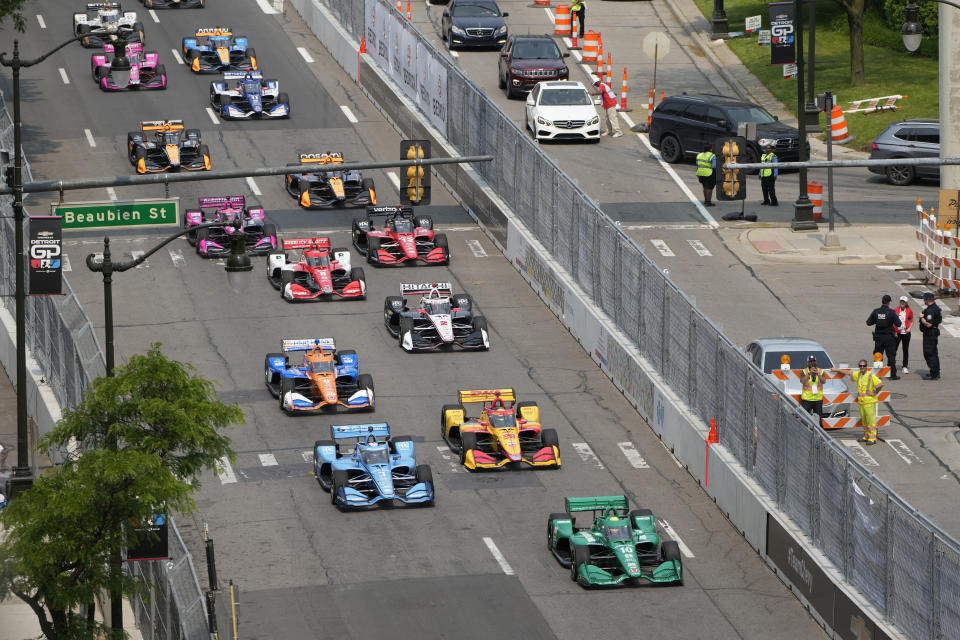 IndyCar points leader Alex Palou (10) starts on the pole at the IndyCar Detroit Grand Prix auto race, Sunday, June 4, 2023, in Detroit. (AP Photo/Carlos Osorio)