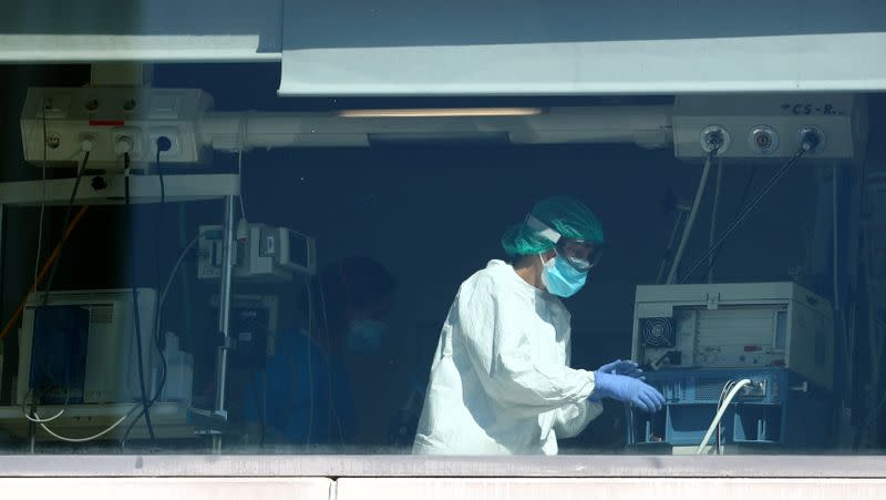 A health worker stands inside ICU at La Paz hospital amid the outbreak of the coronavirus disease (COVID-19) in Madrid