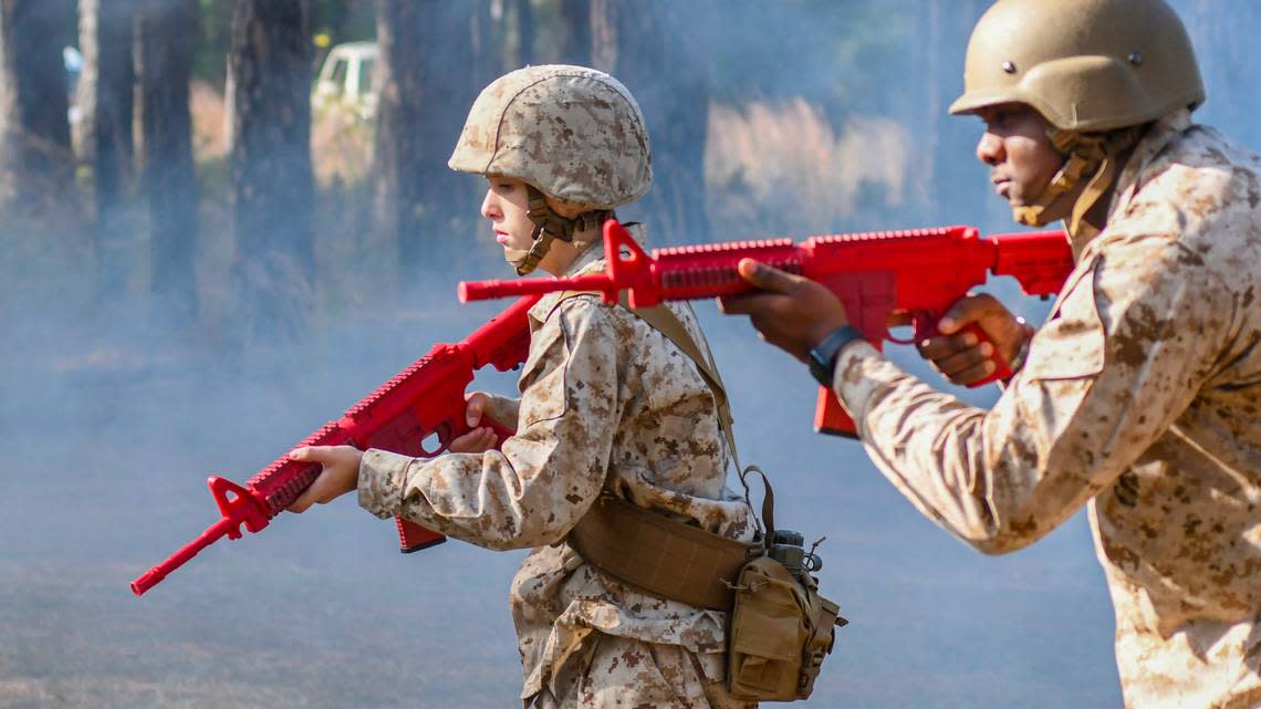 Trent Williams, 12, advances through the Day Movement Course carrying a replica of a M4 carbine rifle on Thursday, Dec. 14, 2023, at Marine Recruit Depot Parris Island. Trent spent the day training as a Marine as part of the Make-A-Wish Foundation. Trent has hypoplastic left heart syndrome, a rare congenital birth defect that affects normal blood flow through his heart.