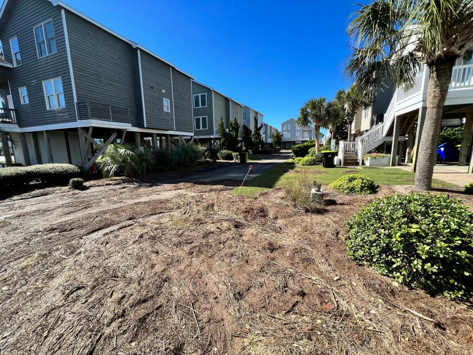 Residents in the Island Park neighborhood on Ocean Isle Beach woke up to a lot of debris and mud Saturday, October 1, as a result of Hurricane Ian's storm surge.
