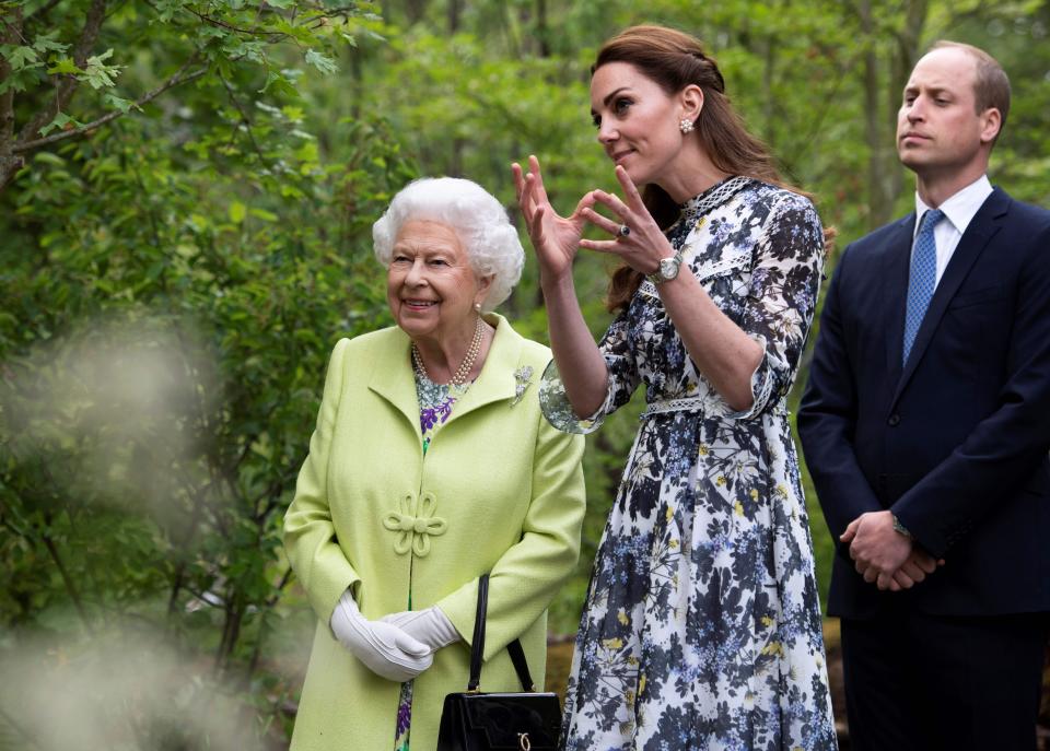 Britain's Catherine, Duchess of Cambridge (C) shows Britain's Queen Elizabeth II (L) and Britain's Prince William, Duke of Cambridge, around the 'Back to Nature Garden' garden, that she designed along with Andree Davies and Adam White, during their visit to the 2019 RHS Chelsea Flower Show in London on May 20, 2019. - The Chelsea flower show is held annually in the grounds of the Royal Hospital Chelsea. (Photo by Geoff Pugh / POOL / AFP)        (Photo credit should read GEOFF PUGH/AFP/Getty Images)