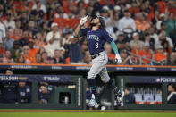 Seattle Mariners shortstop J.P. Crawford (3) celebrates his solo home run against Houston Astros starting pitcher Justin Verlander during the fourth inning in Game 1 of an American League Division Series baseball game in Houston,Tuesday, Oct. 11, 2022. (AP Photo/David J. Phillip)