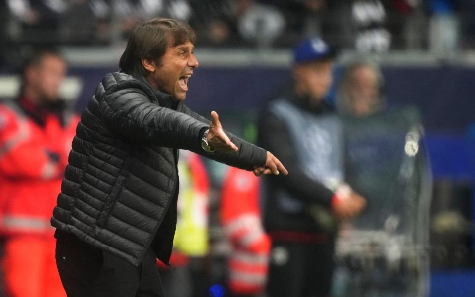 Tottenham's head coach Antonio Conte reacts during the Champions League Group D soccer match between Eintracht Frankfurt and Tottenham Hotspurs in Frankfurt - AP Photo/Michael Probst