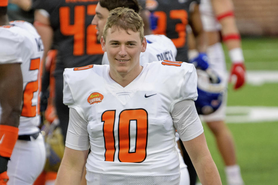 FILE - American Team quarterback Mac Jones of Alabama (10) walks the field during the end of NCAA Senior Bowl college football game in Mobile, Ala., in this Saturday, Jan. 30, 2021, file photo. Jones is expected to be a first round pick in the NFL Draft, April 29-May 1, 2021, in Cleveland. (AP Photo/Matthew Hinton, File)