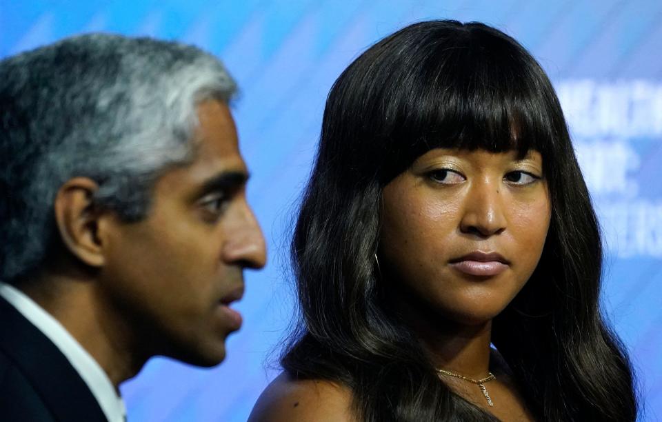 U.S. Surgeon General Dr. Vivek Murthy and Naomi Osaka participate in a forum on mental health and sports on the sidelines of the U.S. Open tennis tournament at the USTA Billie Jean King National Tennis Center in New York City, on Sept. 6, 2023. / Credit: TIMOTHY A. CLARY/AFP via Getty Images