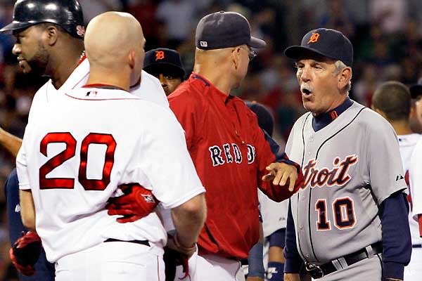 Kevin Youkilis charges the mound after being hit 