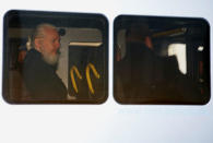 WikiLeaks founder Julian Assange is seen in a police van, after he was arrested by British police, in London, Britain April 11, 2019. REUTERS/Henry Nicholls