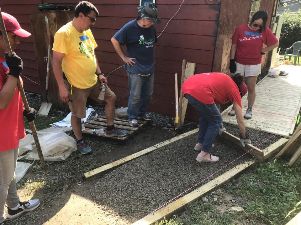 Volunteers from Rebuilding Together North Jersey and Wells Fargo helped install a ramp behind the home of the Van Dunk family in Upper Ringwood on Sept. 8, 2023.