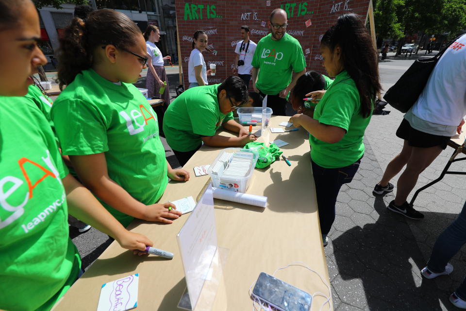 <p>Students create art for the LEAP Public Art Program’s citywide exhibition in Union Square Park in New York City on June 5, 2018. (Photo: Gordon Donovan/Yahoo News) </p>