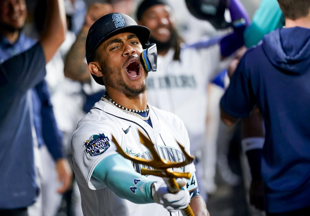 Official Seattle Mariners Julio Rodriguez celebrates with trident shirt