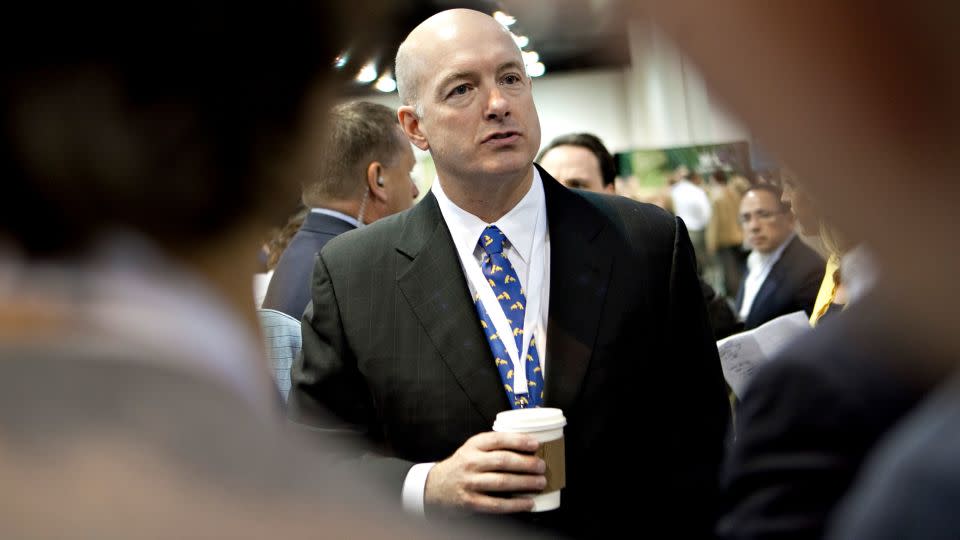 In this 2010 photo, David Sokol speaks to shareholders on the exhibition floor prior to the Berkshire Hathaway Inc. annual meeting in Omaha, Nebraska. - Daniel Acker/Bloomberg/Getty Images