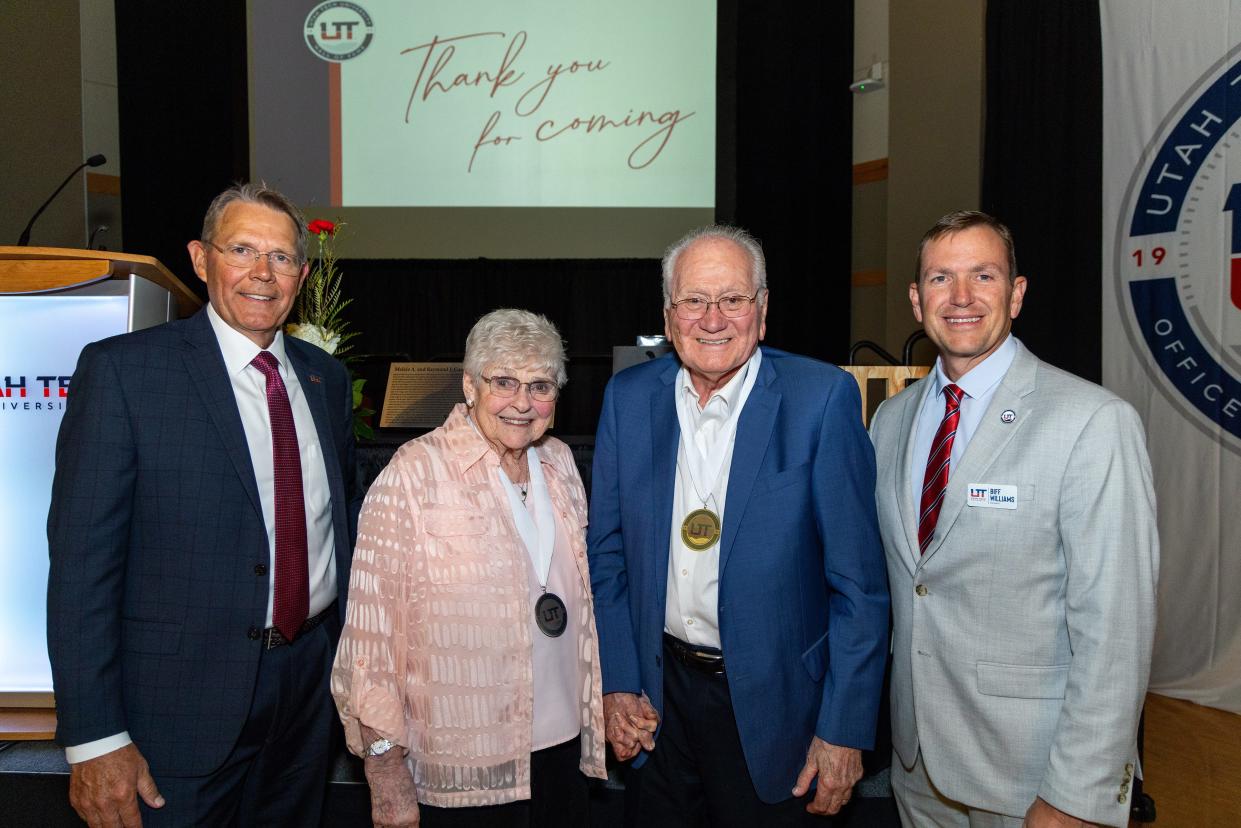 Malzie and Raymond Ganowsky, new inductees into the Utah Tech University Hall of Fame, are flanked by Brad Last, UT's vice president of University Advancement (left) and UT President Biff Williams.