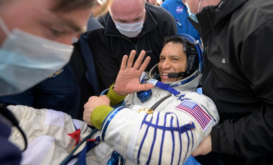 Frank Rubio is helped out of the Soyuz MS-23 spacecraft minutes after he and Russian cosmonauts Sergey Prokopyev and Dmitri Petelin landed in a remote area near the town of Zhezkazgan, Kazakhstan (AP)